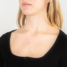 Load image into Gallery viewer, Sterling Silver Rhodium Plated Cubic Zirconia Synthetic Opal Crossover Pendant
