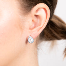 Load image into Gallery viewer, Sterling Silver Rhodium Plated Pear Shaped Blue And White Zirconia Stud Earrings