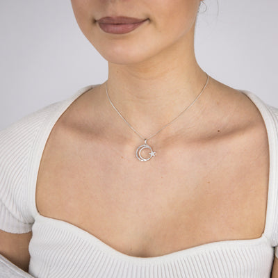 Sterling Silver Rhodium Plated Cubic Zirconia Star And Moon Round Pendant