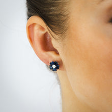 Load image into Gallery viewer, Sterling Silver Rhodium Plated White And Sapphire Blue Cubic Zirconia Flower Stud Earrings