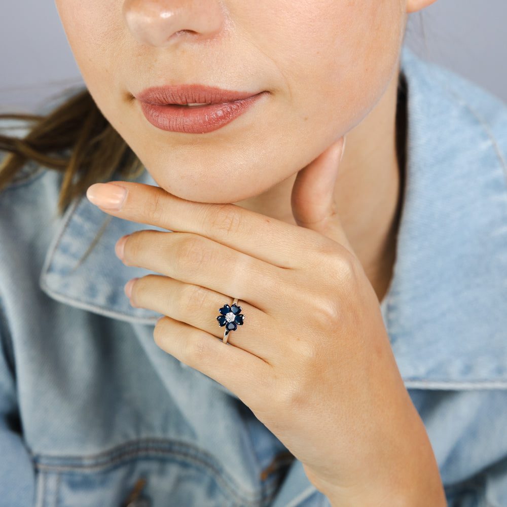 Sterling Silver Rhodium Plated White And Sapphire Blue Cubic Zirconia Flower Ring